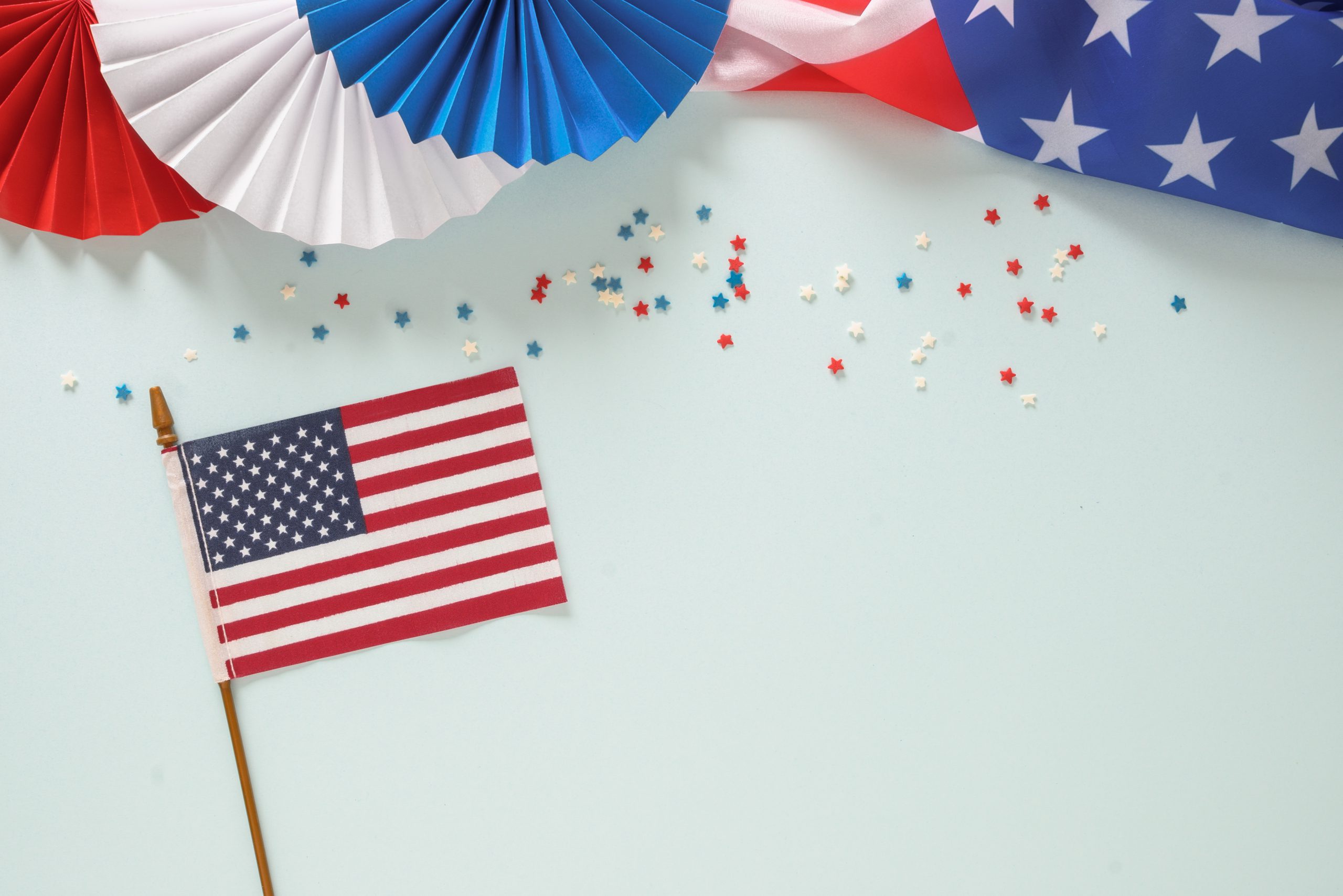 Independence day holiday banner with american flag,confetti stars.